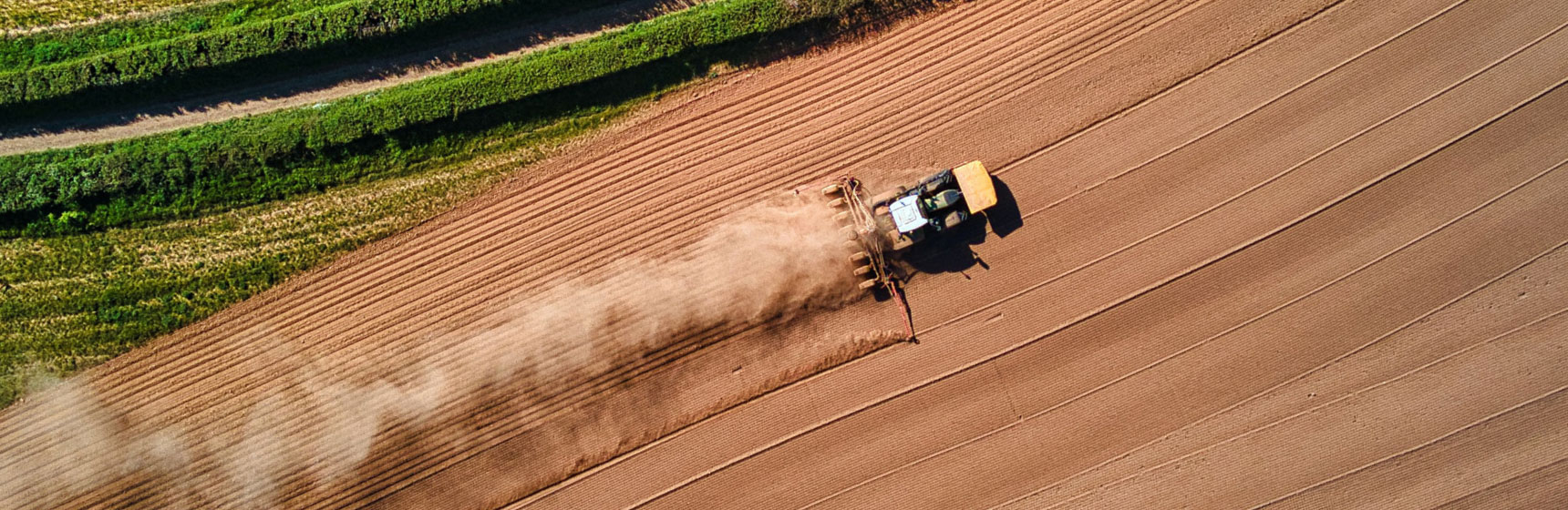 Aerial View of Tractor on Farm
